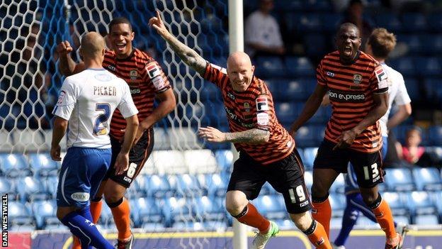 Lee Hughes celebrates his opener