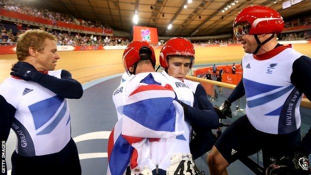 Craig Maclean and Anthony Kappes celebrate with silver medallists Neil Fachie and Barney Storey