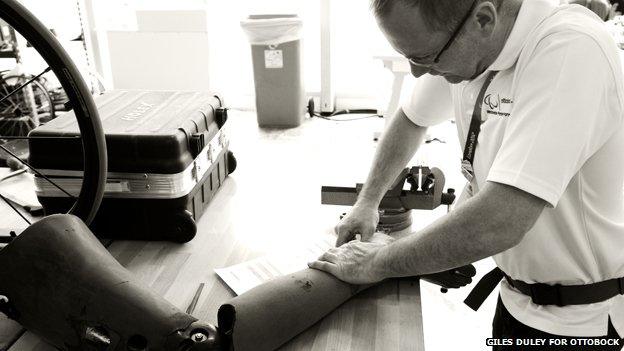 Prosthetist working on a prosthetic limb