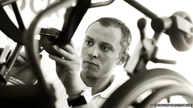 Technician fixing a wheelchair
