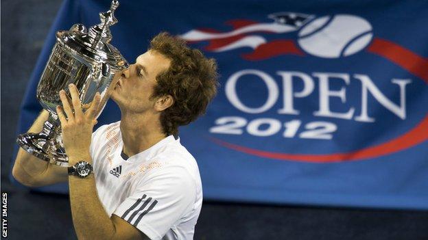 Andy Murray kisses the US Open trophy after winning his first grand slam title