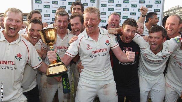 Lancashire with the County Championship cup in 2011