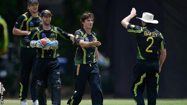 Brad Hogg celebrates