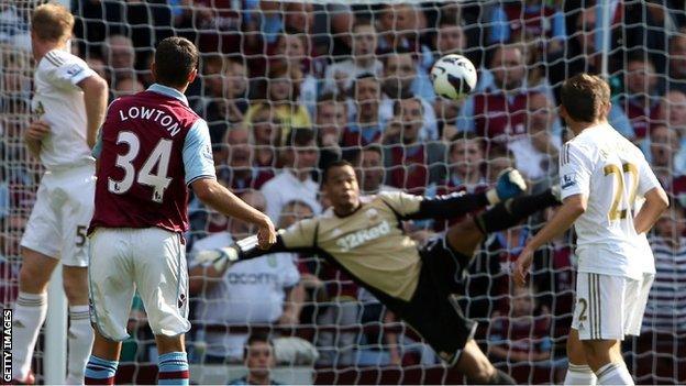 Matthew Lowton's swerving shot beats Swansea keeper Michel Vorm