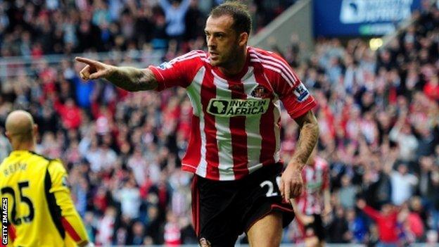 Fletcher celebrates after scoring against Liverpool at the Stadium of Light