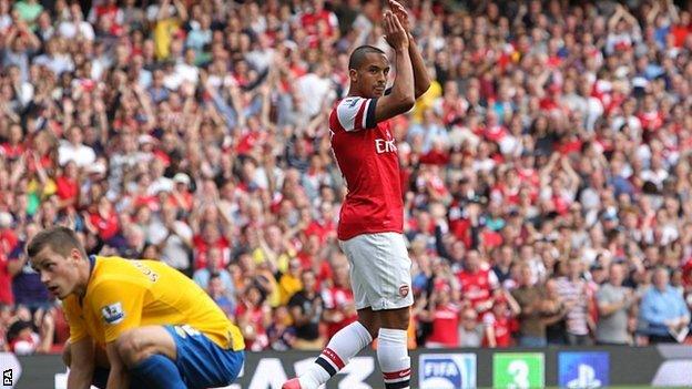 Theo Walcott celebrates scoring against former club Southampton