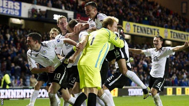 Queens celebrate their penalty shoot-out victory at Ibrox