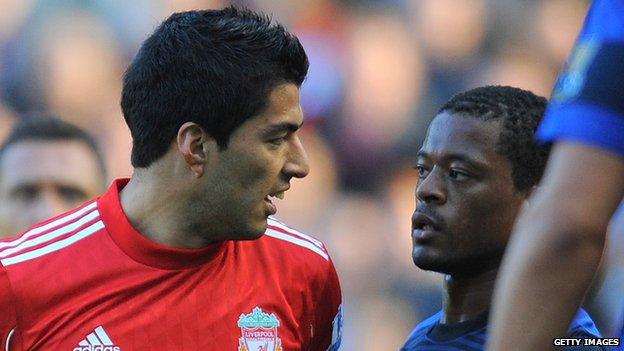 Luis Suarez and Patrice Evra