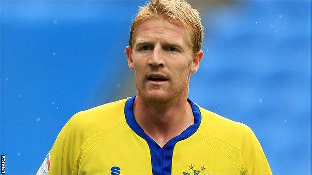 Bury defender Adam Lockwood