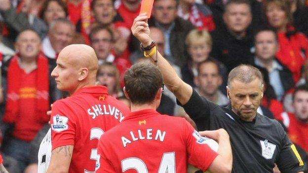 Jonjo Shelvey is shown a red card by Mark Halsey