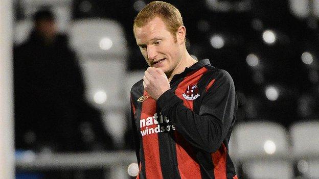 David Magowan walks off after being red-carded