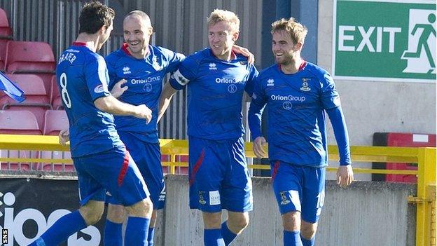 Richie Foran (second from right) celebrates with teammates after scoring his second goal for Inverness