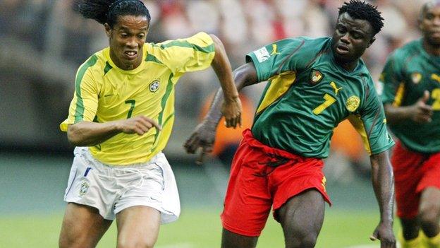 Modest Mbami (right)