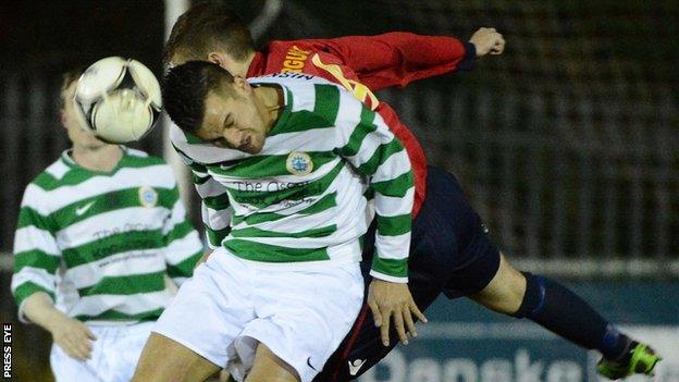 Mark Miskimmin of Donegal Celtic gets the ball before Lisburn Distillery's Andrew Ferguson