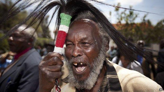 Lawrence Mathenge, representative of the Mau Mau War Veterans Association, celebrates the announcement of a legal decision in London concerning Mau Mau veterans at the offices of the Kenya Human Rights Commission in Nairobi - 5 October 2012