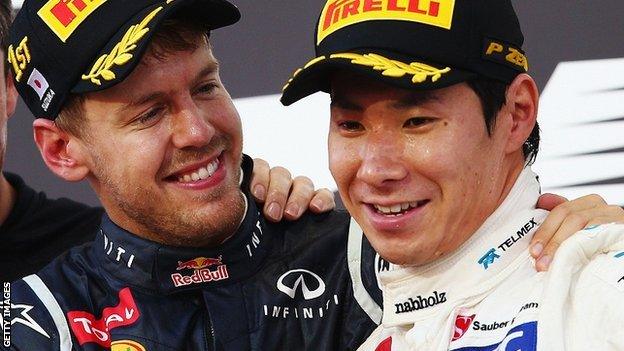 Sebastian Vettel and Kamui Kobayashi