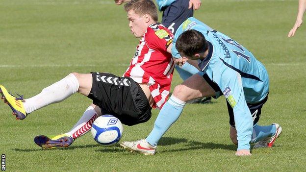 Derry's Simon Madden in action against Paddy Kavanagh of Shelbourne