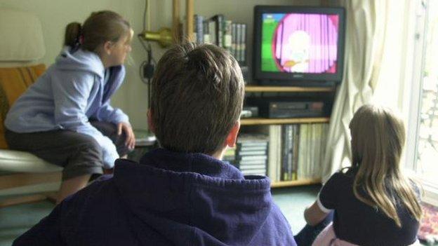 Children watching TV