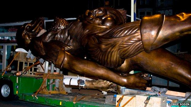 Hirst statue Verity on a lorry in Ilfracombe