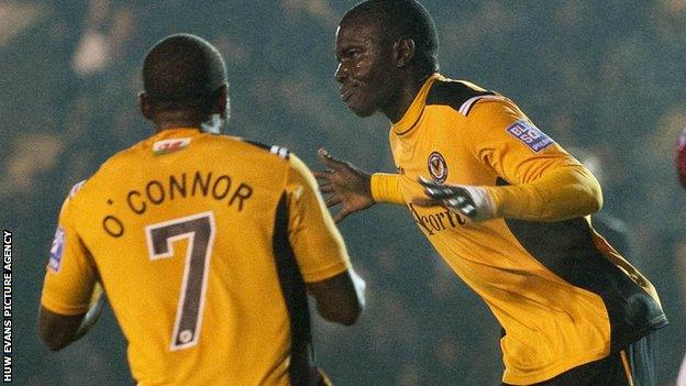 Ismail Yakubu celebrates after scoring for Newport