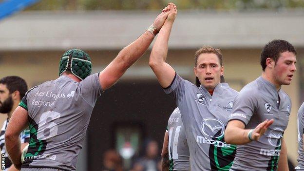 Dan Parks congratulates John Muldoon after the flanker's try in Parma