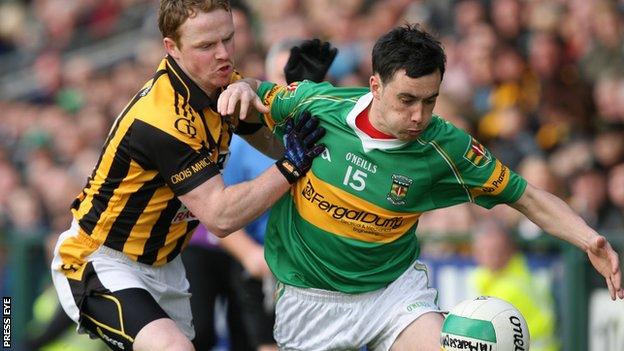 Crossmaglen's Paul McKeown battles with Pearse Og's Marc Cullen in the Armagh Football Final