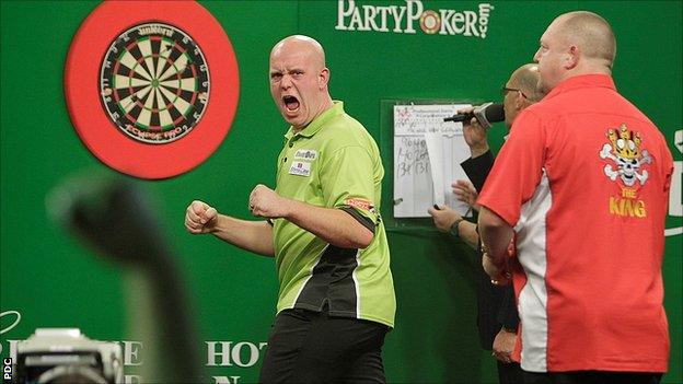 Michael van Gerwen celebrates winning a leg against Mervyn King