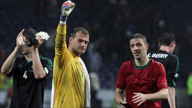 Northern Ireland players celebrate after the final whistle in Porto