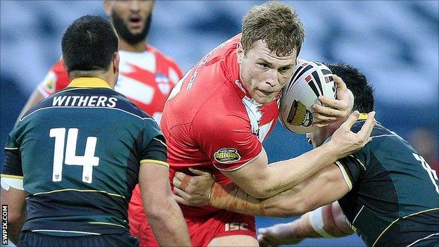 Wigan's Scott Taylor in action for England
