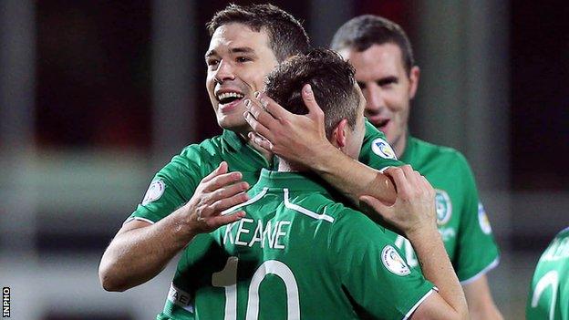 Darren O'Dea celebrates with Robbie Keane after the Republic's second goal in Torshavn