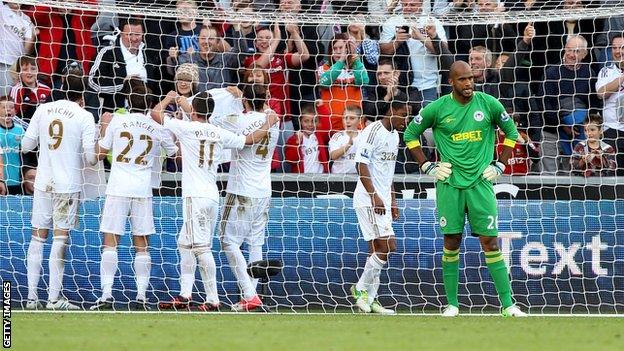 Michu celebrates his goal