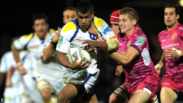 Classy Clermont centre Wesley Fofana is tackled by Exeter fly-half Gareth Steenson