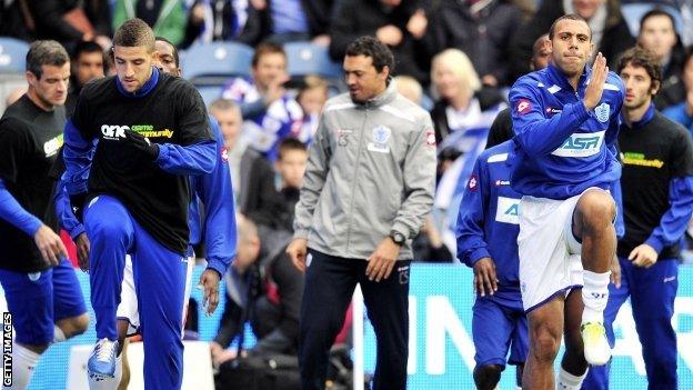 QPR's Anton Ferdinand (right) did not wear a Kick It Out T-shirt