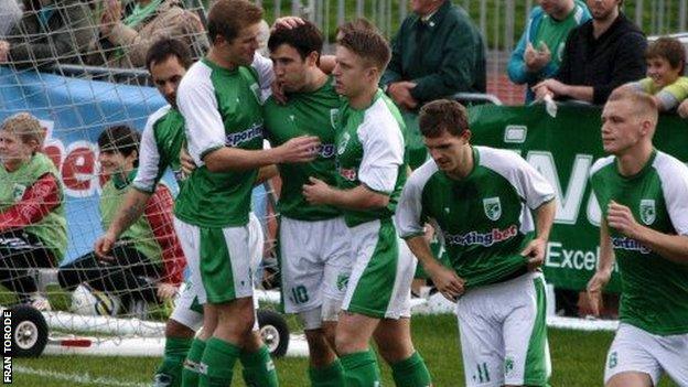 Hat-trick man Ross Allen is congratulated by his team mates