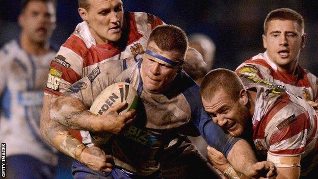 Stuart Dickens (centre) playing against Wigan