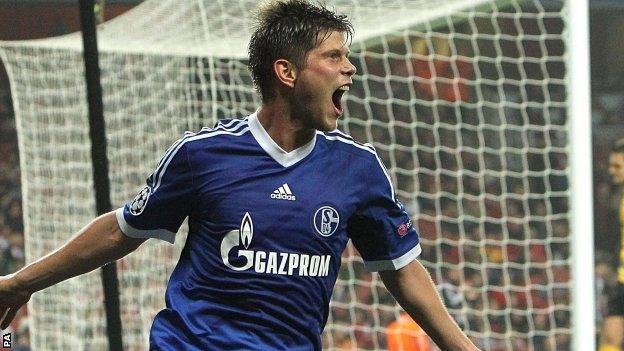 Schalke's Klaas-Jan Huntelaar (right)celebrates scoring their first goal