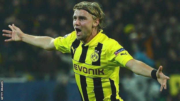 Marcel Schmelzer of Dortmund celebrates after scoring against Real Madrid