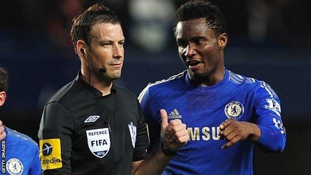 Mark Clattenburg and John Obi Mikel