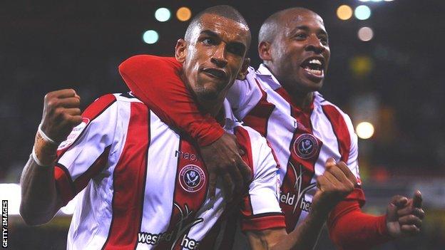 Nick Blackman of Sheffield United (left) is congratulated on scoring by Matt Hill