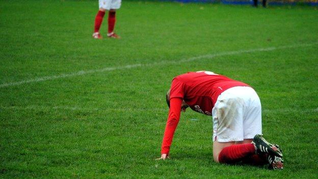 Forest player on the ground