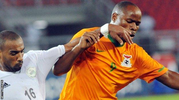 Collins Mbesuma (right)