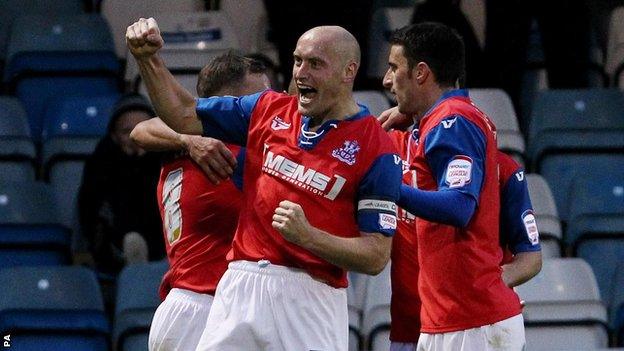 Gillingham celebrate a goal