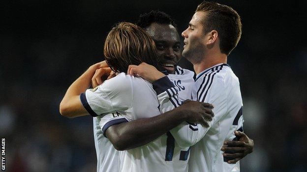 Michael Essien (centre) celebrates after scoring his first goal for Real Madrid