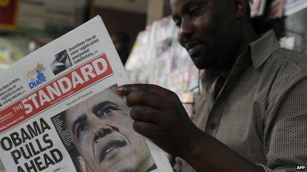 A Kenyan reading a newspaper in Nairobi on Wednesday 7 November 2012