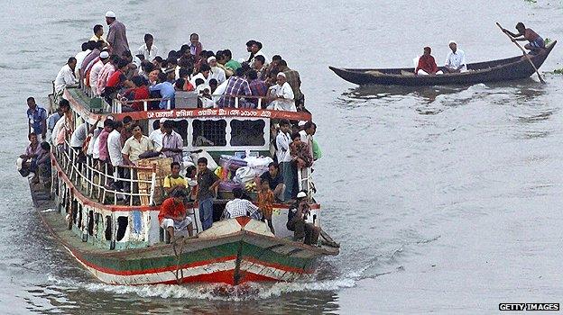 Overcrowded ferry in Dhaka