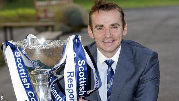 St Mirren manager Danny Lennon poses with the Scottish Communities League Cup