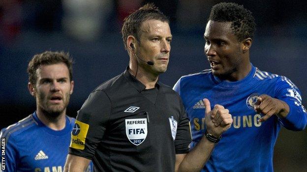 Mark Clattenburg and John Mikel Obi