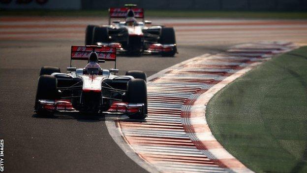 Jenson Button (front) and Lewis Hamilton