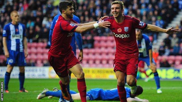 James Morrison celebrates his goal for West Brom against Wigan