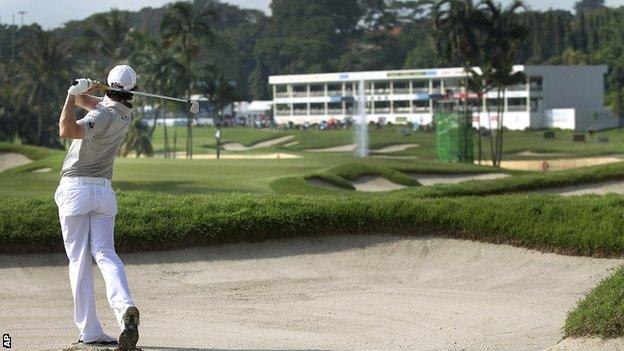 Rory McIlroy plays to the 16th green at the Sentosa Golf Club